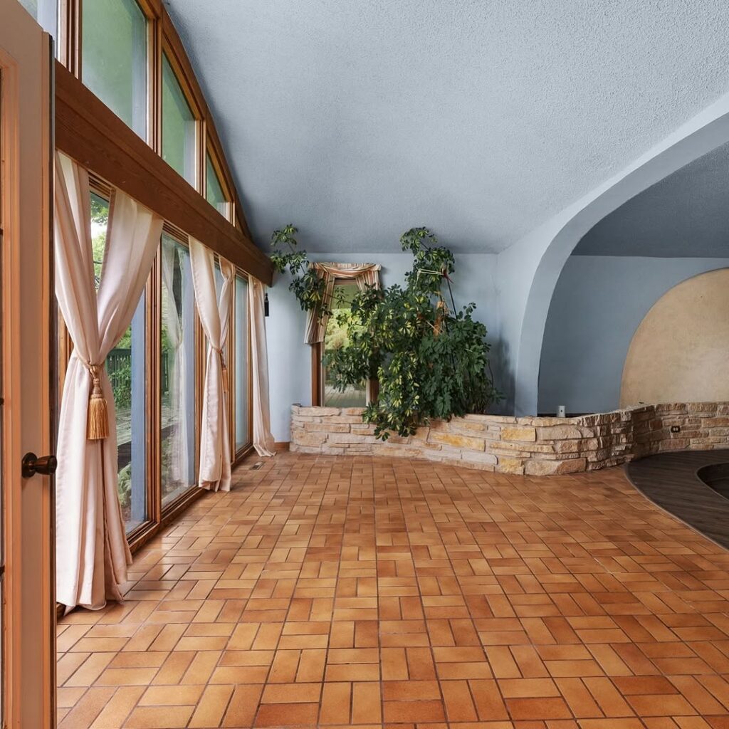 Discover the Charm of an Earth Berm Home for Your Weekend Getaway: Only $479,900!